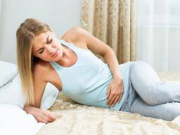 Premenstruacní syndrom (PMS): Príznaky, príciny a lécba